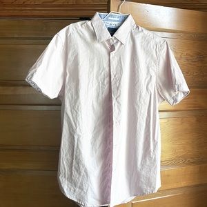 Light pink with navy blue dotting. Flippable floral pattern in sleeve.